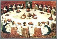 El Rey Arturo y sus aliados comparten la comida en la famosa mesa redonda de Camelot